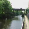 Dual carriageway bridge over both the canal and the Don.  The towpath is cantilevered out under the bridge by John Howarth – 28 May 2009