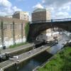 Lock with Limehouse Basin beyond by PeterScott – 5 May 2005