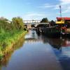 Heading north towards Wincham Wharf - Colliery Narrowboat Co and Wharf Pub under Basin Bridge by PIG and PINEAPPLE – 13 September 2004