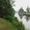 Misty in the distance after a hefty ran shower. Junction Lock is away to the left behind the trees by John Howarth – 31 July 2008