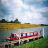 Floating moorings by the bridge by MR & SM Atty – 25 July 1991
